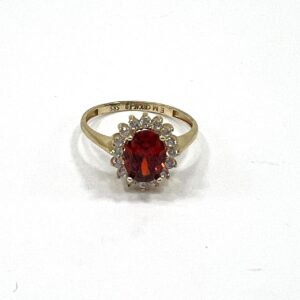 Yellow Gold 14K ring with a red oval -shaped stone, elegant and refined