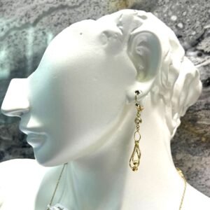 Long 14K yellow gold earrings with a charming  with ball inside