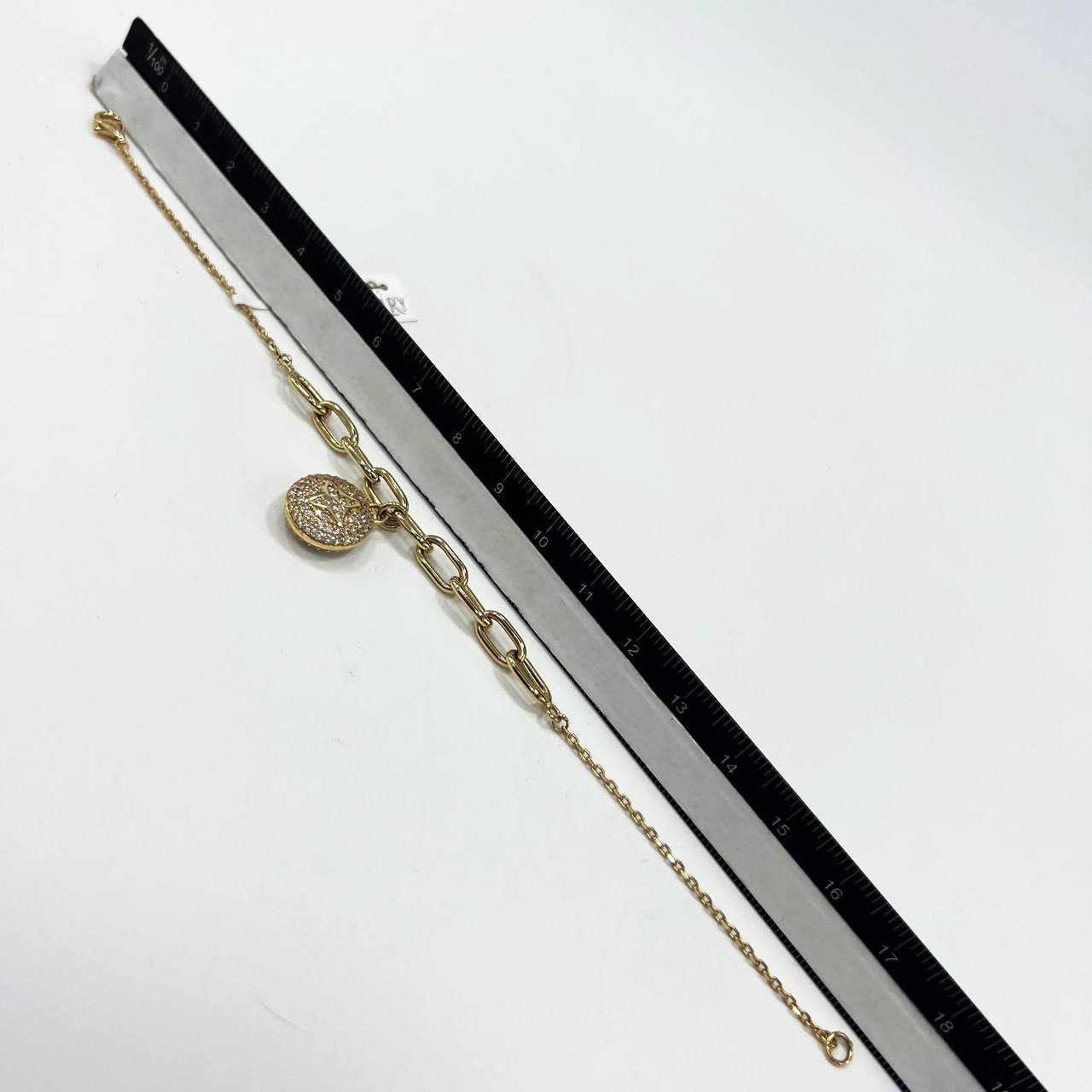 Beautiful 14K yellow gold bracelet with a chain & zircon decorated circle charm - Image 9