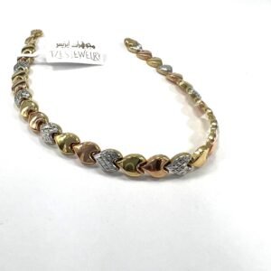 14K gold bracelet in yellow white & rose tones featuring a delicate heart design