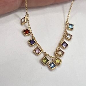 14K yellow gold bracelet adorned with vibrant multicolored stones, elegant charm