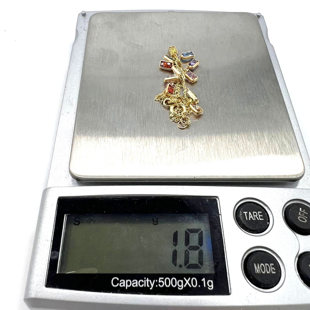 Elegant 14K gold bracelet adorned with vibrant multicolored rectangular stones - Image 9