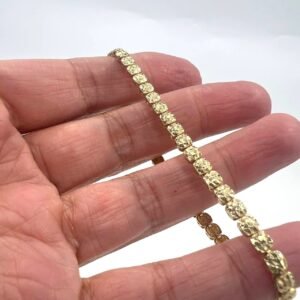 14K yellow gold bracelet with a shiny engraved pattern — elegant and radiant