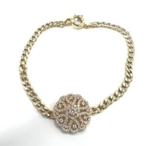 14K yellow gold bracelet featuring a delicate flower center adorned with zircon.