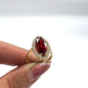 Yellow Gold 14K ring with a red marquise-shaped stone, elegant and refined.
